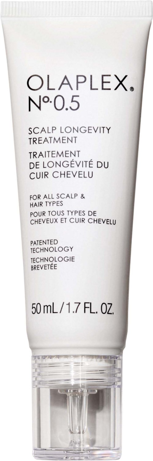A white tube of Olaplex No. 0.5 scalp treatment with text, transparent cap, and size details.