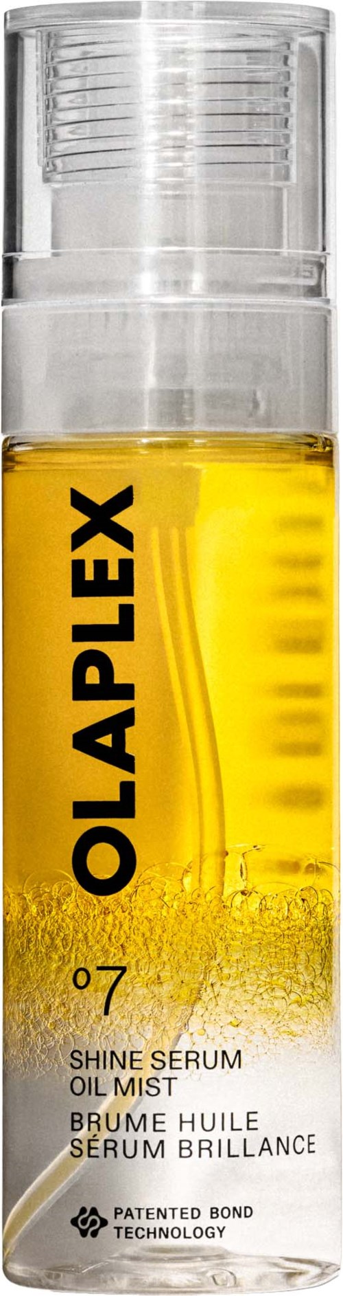 En klar sprayflaska med gult olja och transparent lock, märkt OLAPLEX Shine Serum Oil Mist.