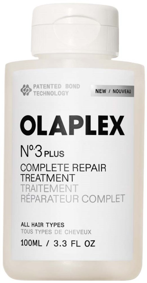 Eine weiße Flasche mit Olaplex No. 3 Plus Reparaturbehandlung für alle Haartypen mit sauberer Etikette.