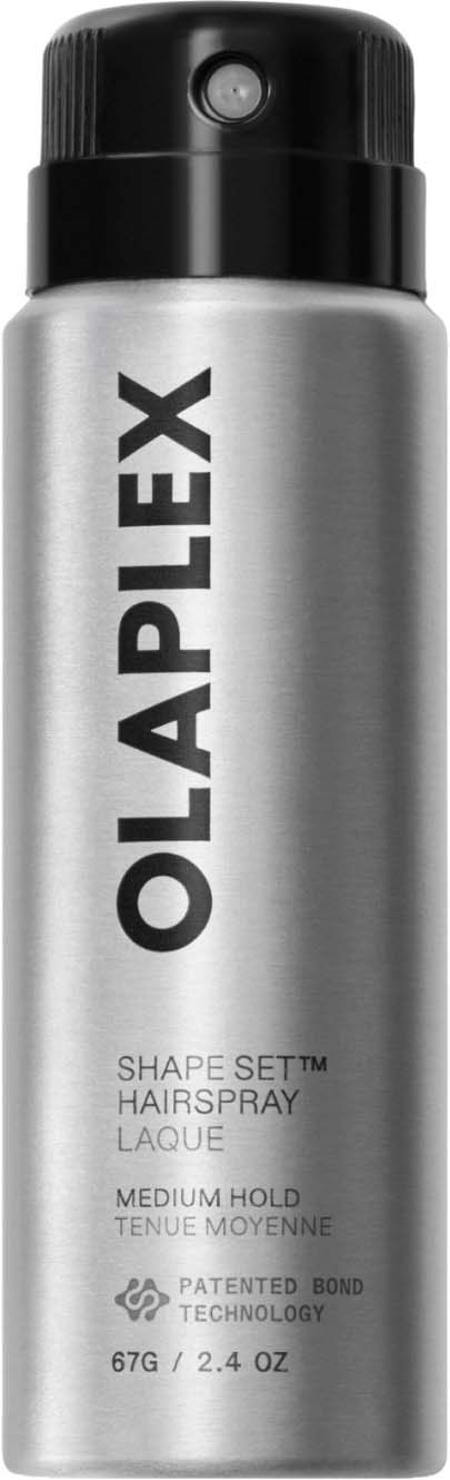 A silver can of Olaplex Shape Set Hairspray with a black cap, featuring product name and details in black text.
