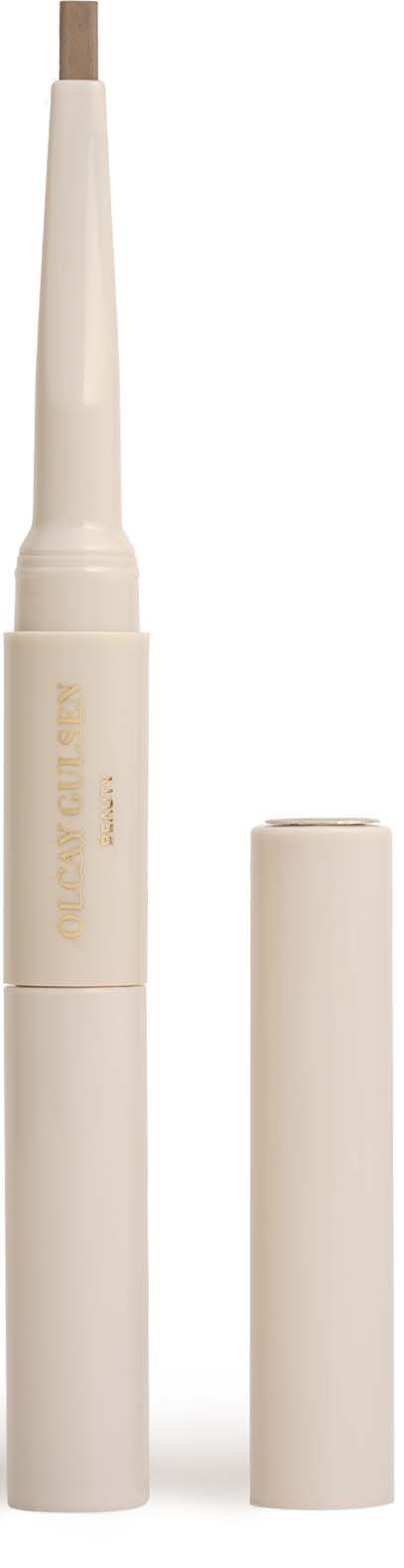 A white lip balm stick with a cap placed beside it, used for moisturizing lips.
