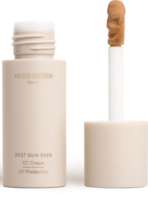 En vit burk med hudkräm och applikatorsticka med beige produkt, märkt 'Best Skin Ever'.