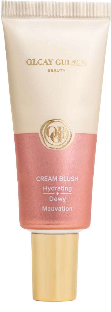 Een tube Olcy Gulsən cream blush, roze en beige kleuren, met gouden dop en tekst die hydrateert en verfraait.