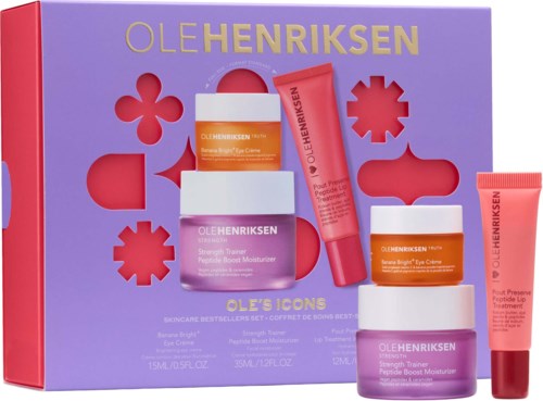 Box with Ole Henriksen skincare products, including creams, eye gel, and a red tube, colorfully arranged.