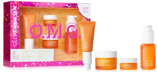 Hudvårdsset med fem orange och vita flaskor och burkar, förpackade i en rosa box med "O.M.G"-label.