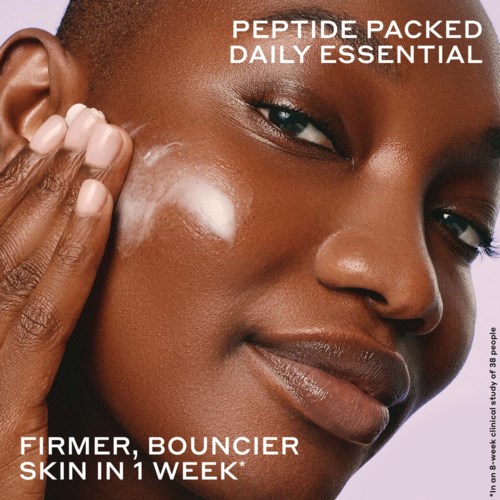 Close-up of a person with smooth, glowing skin, touching their cheek, promoting a skincare product for firm skin.