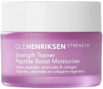 A small jar of pink cream labeled Ole Henriksen Strength, with product details about peptides, ceramides, and collagen.