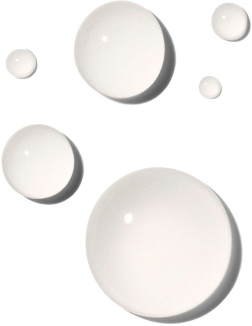 Several white spheres of different sizes floating with shadows on a white background.