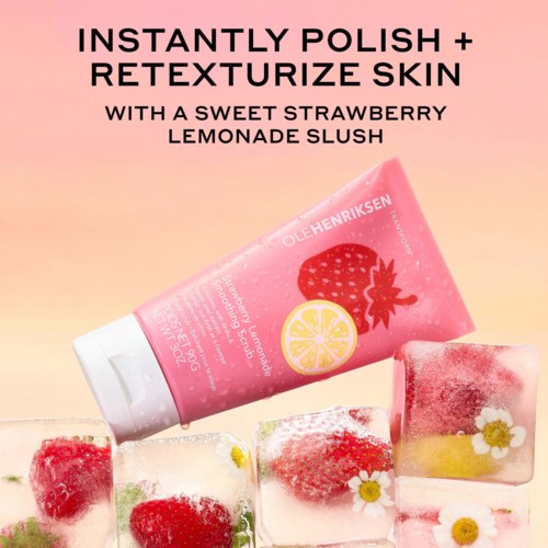 Pinke Tube mit Hautpflegecreme, abgebildet mit Erdbeeren und Zitrone, umgeben von Eiswürfeln mit Erdbeeren und Zitrone.
