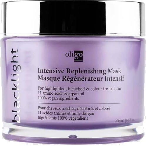 Fioletowa puszka maski do włosów z czarnym i srebrnym wieczkiem, oznaczona ‚Intensive Replenishing Mask‘ dla zniszczonych, koloryzowanych włosów.