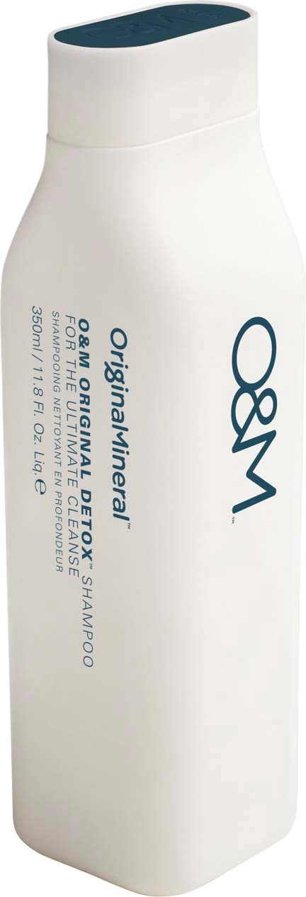 En vit flaska märkt 'O&M OriginalMineral Detox Shampoo'.