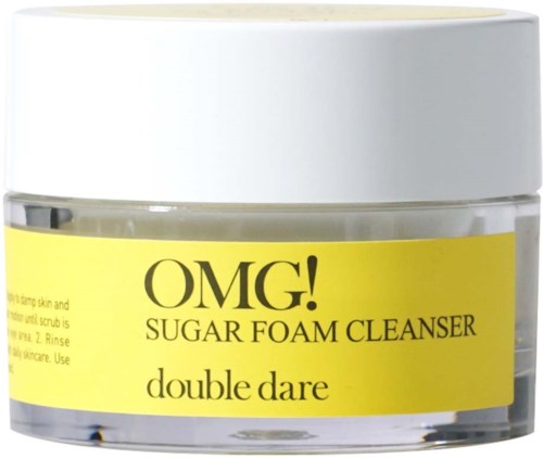 A small round jar with a white lid and yellow label. It is a sugar foam cleanser from the brand Double Dare.