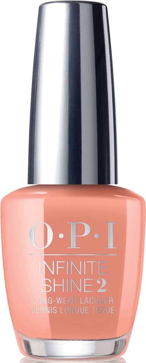 En flaska nagellack i peachfärg med silverlock, märkt 'O.P.I Infinite Shine 2' för långvarigt bruk.