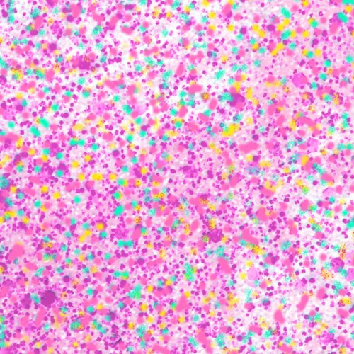 Färgglad konfetti i rosa, gult, blått och lila spritt över en yta.