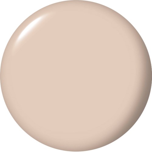 Ett beige, runt sminkkompakt med slät yta.