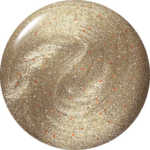 A shiny, round object covered with gold and silver glitter, with small reddish-orange spots scattered on it.