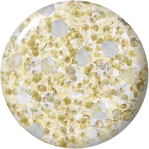 A circular, close-up view of a mixture with small gold and silver glitter particles.