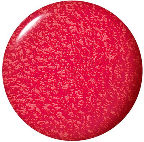 A red golf ball with a textured surface and a shiny reflection.