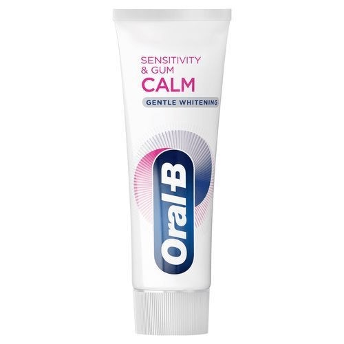 A white tube of toothpaste with blue and pink text and logo, labeled for sensitive teeth and gum calming.