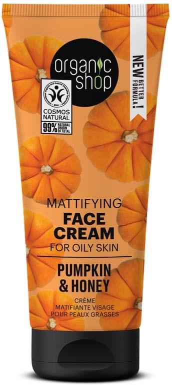 Oranje verpakking met pompoenen, zwarte en witte tekst, en logo's. Product is gezichtscrème voor vette huid met pompoen en honing.