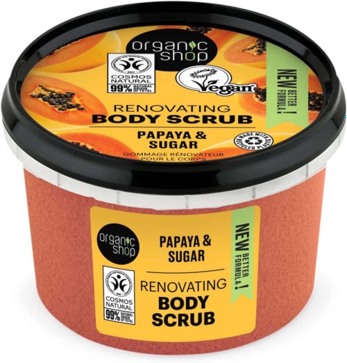 En rund behållare med body scrub, etikett i orange och svart, innehåller papaya och socker.