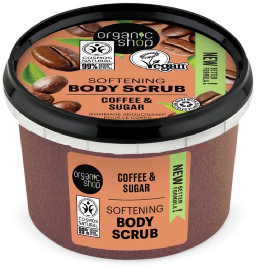 A round container of body scrub labeled with coffee and sugar, promoting softness and organic ingredients.