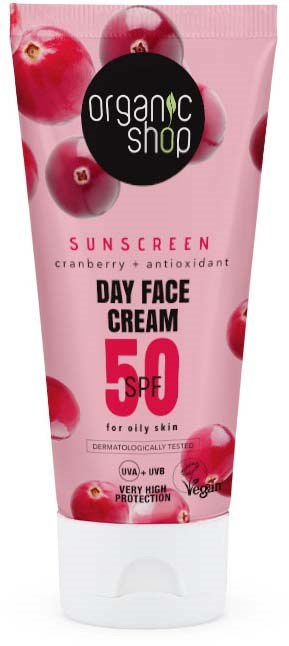En rosa tube med tranbär, som främjar ekologisk solskyddsmedel för fet hud, SPF 50 och veganska ingredienser.