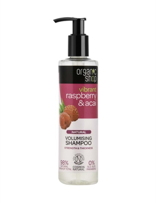 En flaska med ekologiskt hallon- och acai-volymgivande schampo med pump, märkt som naturligt och cruelty-free.