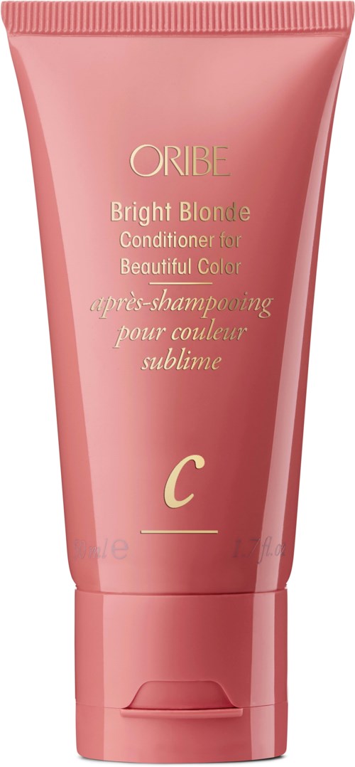 Ljusrosa tub med Oribe Bright Blonde balsam för vackert, glänsande blont hår.