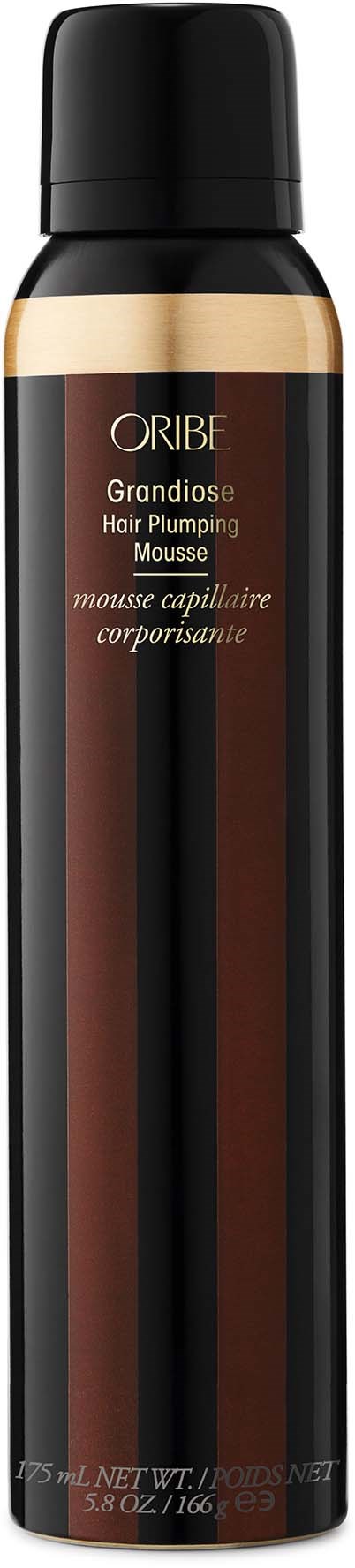 A black can with gold and brown accents, labeled as Oribe Grandiose Hair Plumping Mousse.