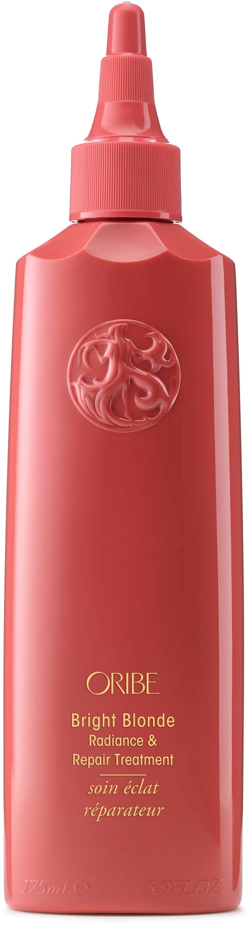 En rosa flaska med en spetsig kork märkt 'Oribe Bright Blonde Repair Treatment.'