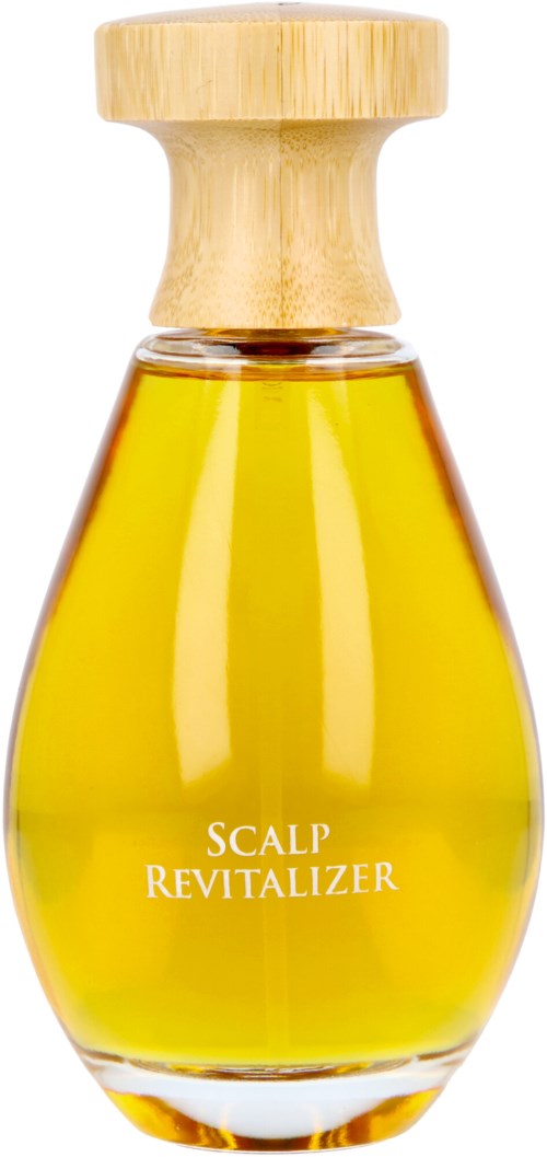 En liten glasflaska med trädocka och etikett 'Scalp Revitalizer' i vitt.