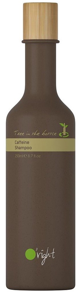 En brun flaska med ett trälock, märkt som koffeinshampoo, från ett naturligt märke. Den är lång och smal.
