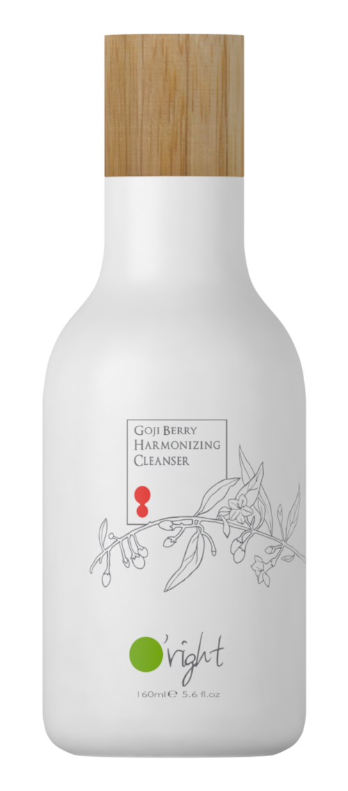 En vit flaska med en trälock, märkt 'Goji Berry Harmonizing Cleanser', med en blad- och grenillustration.