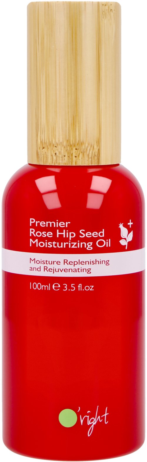 Röd flaska med trädockslocka för återfuktande olja, märkt 'Premier Rose Hip Seed Moisturizing Oil' och 'right'-logotypen.