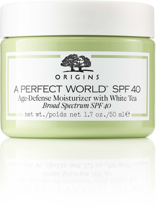 A green jar of Origins moisturizer with SPF 40, made with white tea, for age defense.