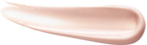 A smear of light pink cream or lotion on a white background.