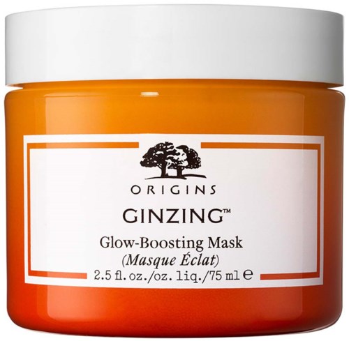 Orange behållare med vit lock, etikett visar ett träd och beskriver en glow-boosting mask.
