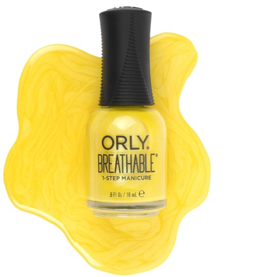 Yellow nail polish bottle with the product name 'Breathable'. It has black cap and spilled polish around it.