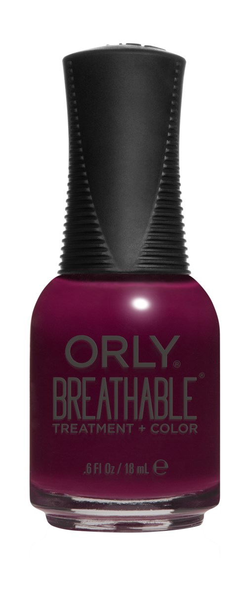En flaske med Orly Breathable neglelakk i mørk rosa med svart lokk.