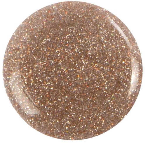 Guldglittrig substans i en rund behållare, ser ut som nagellack eller kosmetikglitter.