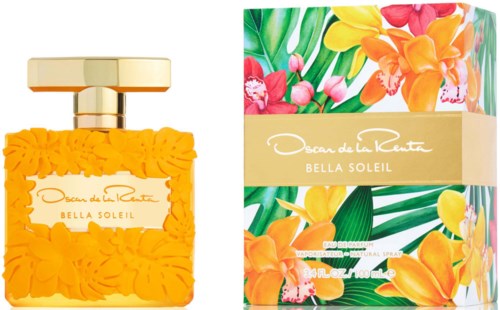 Butelka perfum z żółtymi kwiatami i kolorowe pudełko z kwiatami, oba oznaczone 'Bella Soleil' od Oscar de la Renta.