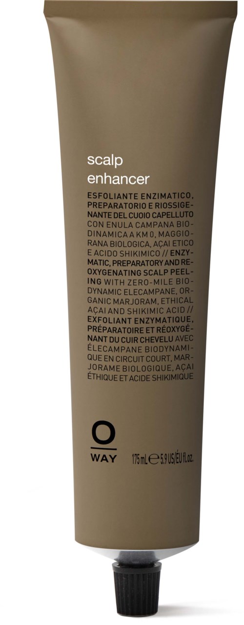 En beige tub med svart lock, märkt "scalp enhancer" och innehåller hårvårdsprodukt.