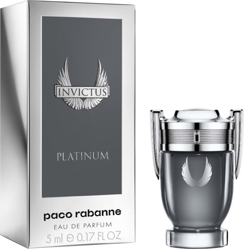 A perfume bottle with a silver lid next to a box labeled 'Invictus Platinum' by Paco Rabanne.