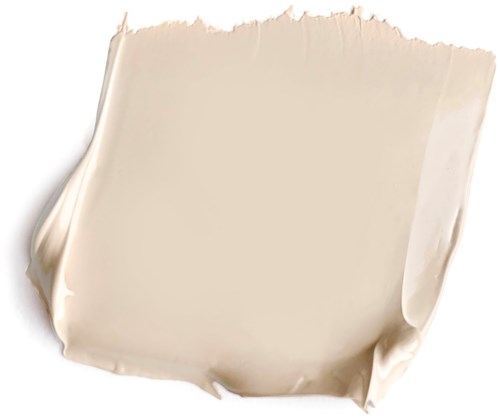En trasig bit av beige papper eller tyg med grova kanter. Det ser mjukt och texturerat ut.