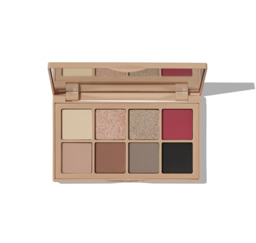 En sminkpalett med åtte forskjellige nyanser, inkludert beige, rosa, brunt, grått, svart og glitterfarger.