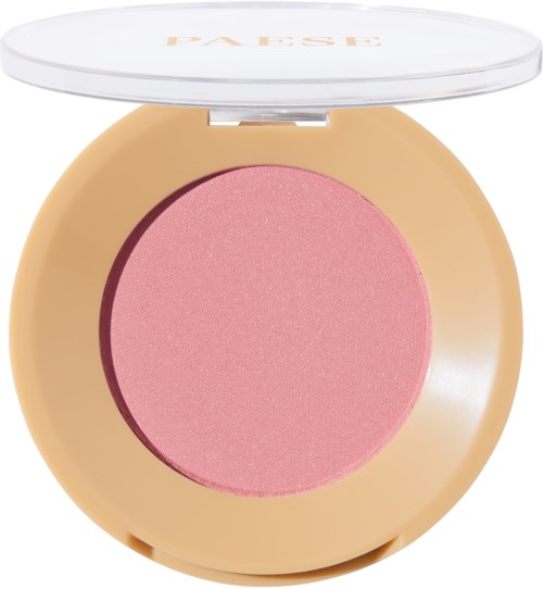Ein runder Make-up-Blush in einem beigen Gehäuse mit klarem Kunststoffdeckel, rosa.