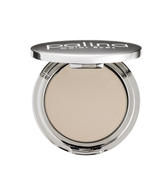 Ett kompakt sminkprodukt med beige puder inuti och ett svart lock med vitt text.