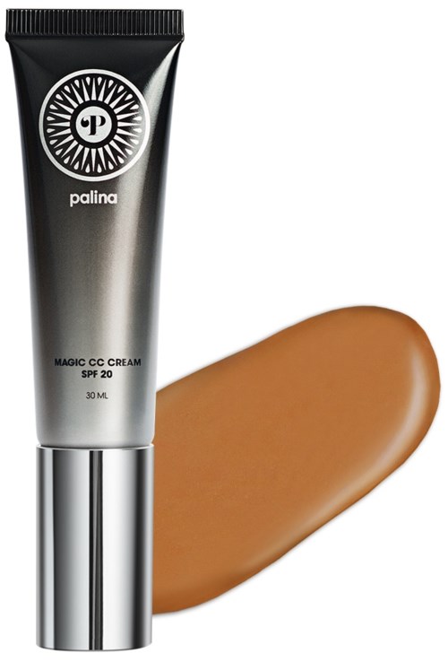 Ett tub Palina Magic CC Cream med SPF 20 och en klutt av beige foundation eller täckning.