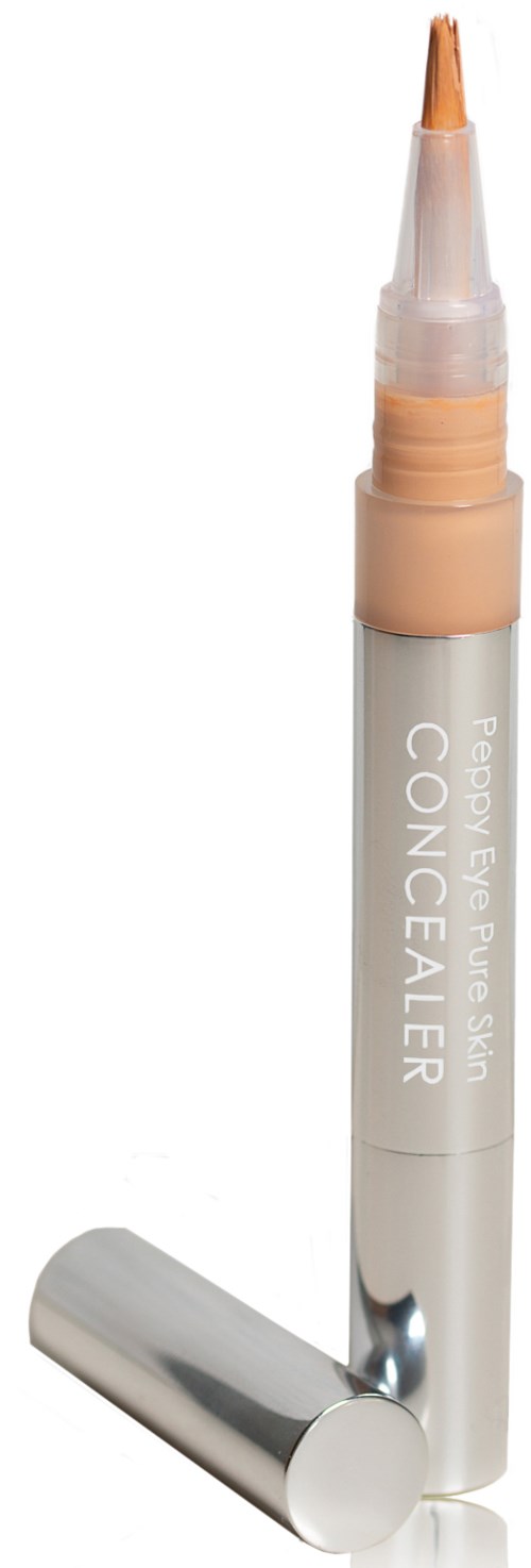En beige concealer-penne med lokk, designet for sminke, står oppreist med lokket fjernet.